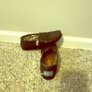 Toms little girl shoes.